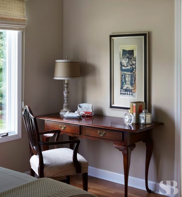 guest bedroom desk and chair with beige walls