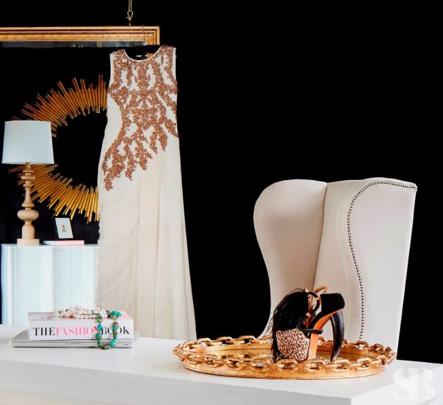 white chair with gold desk accessories