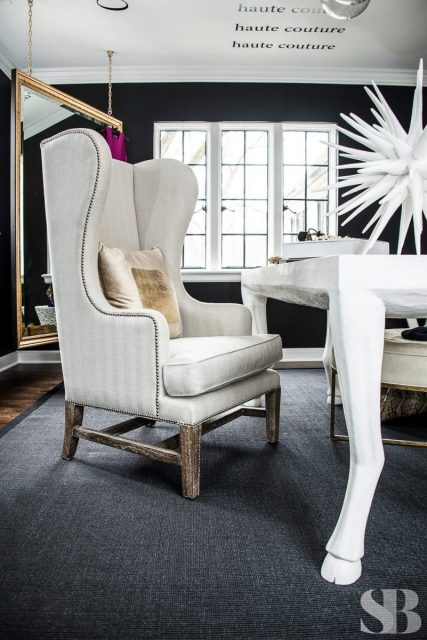 white upholstered arm chair