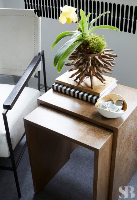 nested wooden tables with accessories