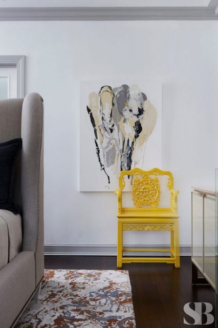 yellow chair and painting