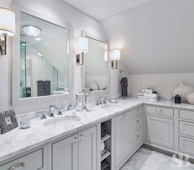 masterbatroom with white cabinets