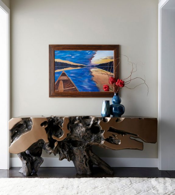 wooden sculpture table and painting