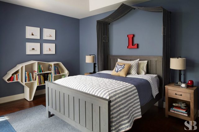 little boy's room with blue walls