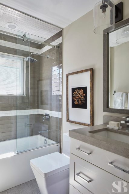 square toilet and glass shower