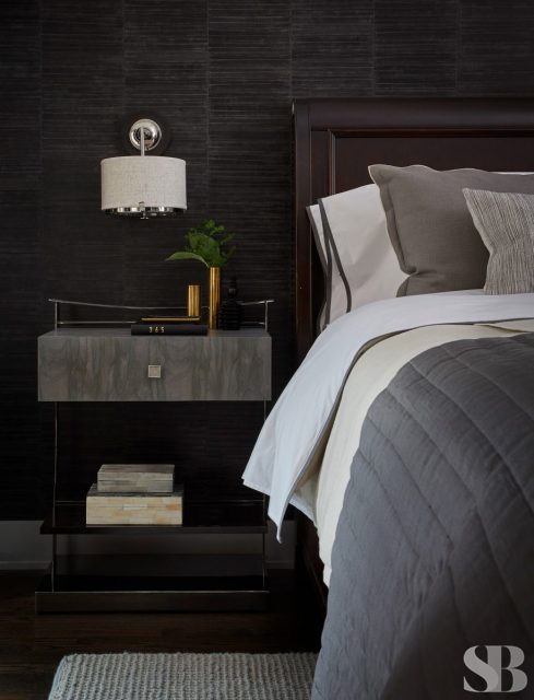 nightstand against chocolate wall