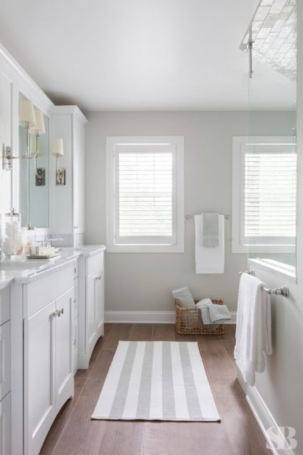 bathroom with gray and white striped mat