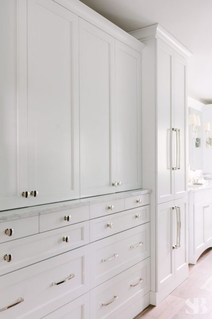 white cabinet bathroom storage wall