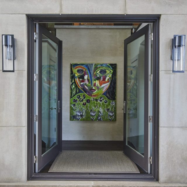 Exterior Doors opening to condo entryway and painting