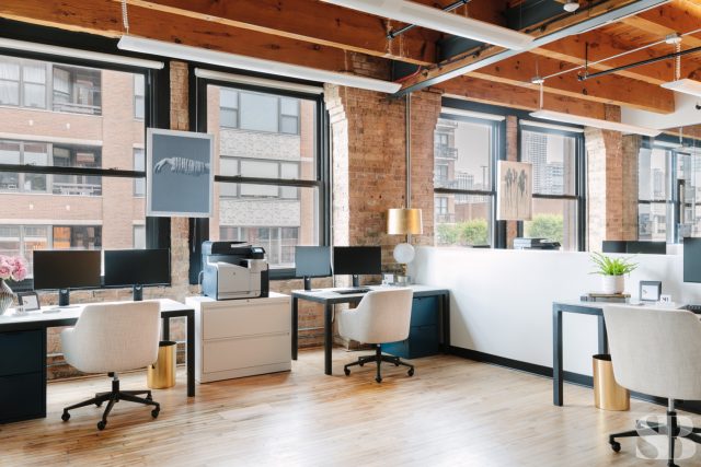 two office desks and chairs